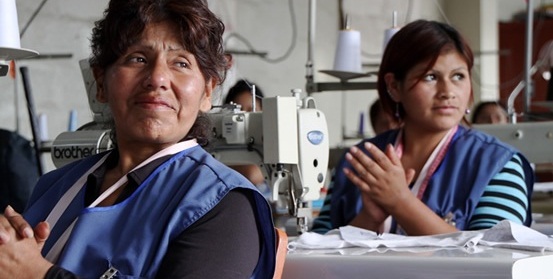 Proyecto Salta's 100,000th graduate,María Zulema Ballona Morante, pictured center